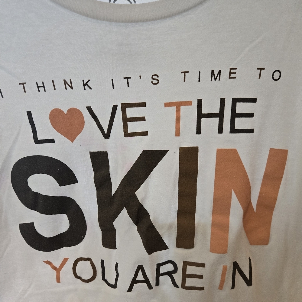White Graphic Tee with Black and Orange Text